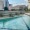 a pool with a city view