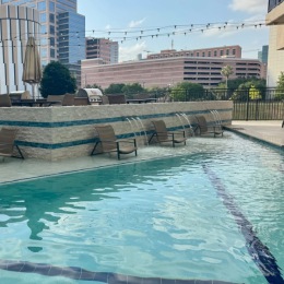 a pool with a city view